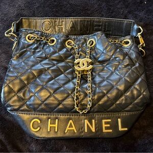 Authentic Chanel Black Quilted Shoulder Bag with Gold Accents